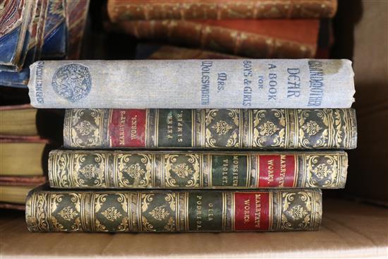 A collection of quarter calf volumes of Kipling and Marryatts Works